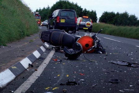 Watch as Reckless Driver Forces Biker to Crash