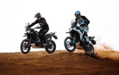 Two CFMoto 800MT-X bikes in action