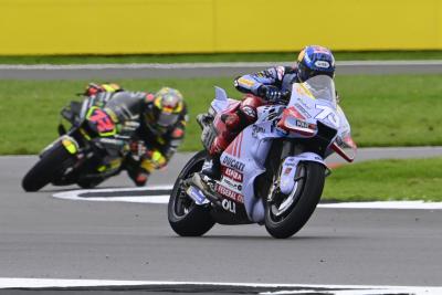 Alex Marquez leads Marco Bezzecchi, 2023 MotoGP British Grand Prix. - Gold and Goose