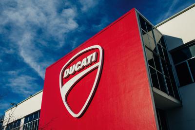 Ducati logo at factory. - Ducati Media.