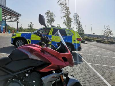 Triumph Tiger Sport 660 and police car