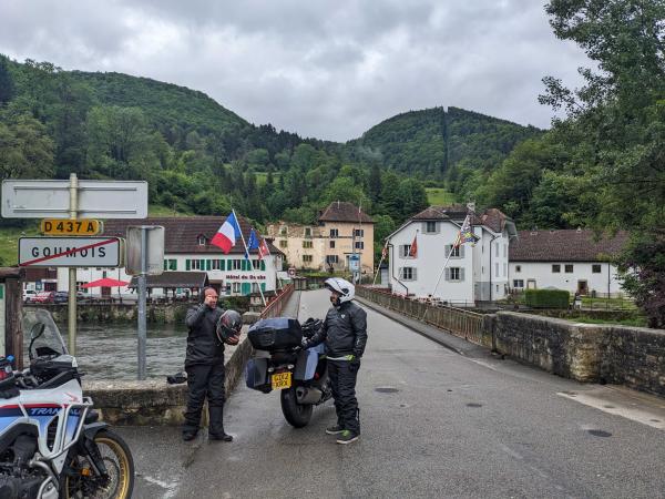Two damp riders on the French/Swiss border