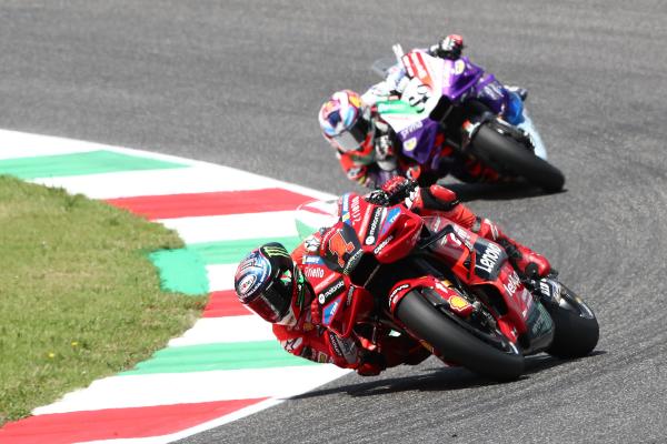 Francesco Bagnaia leads Jorge Martin, 2023 MotoGP Italian Grand Prix. - Gold and Gooose