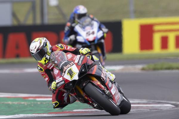 Alvaro Bautista leads Toprak Razgatlioglu, 2023 UK WorldSBK. - Gold and Goose