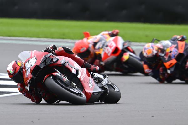 Pol Espargaro leads Jack Miller, Marc Marquez, 2023 MotoGP British Grand Prix. - Gold and goose