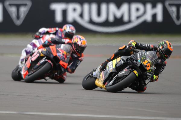 Luca Marini leads Jack Miller, Johann Zarco, 2023 MotoGP British Grand Prix. - Gold and Goose