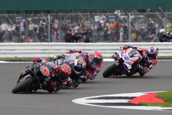 Fabio Quartararo leads Fabio Di Giannantonio, Raul Fernandez, Jorge Martin, 2023 MotoGP British Grand Prix. - Gold and Goose