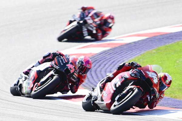 Pol Esoargaro leads Aleix Espargaro, Maverick Vinales, 2023 MotoGP Austrian Grand Prix. - Gold and Goose