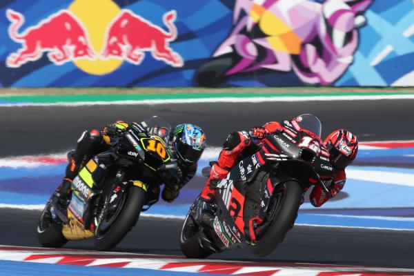 Maverick Vinales leads Luca Marini, 2023 MotoGP San Marino Grand Prix. - Gold and Goose