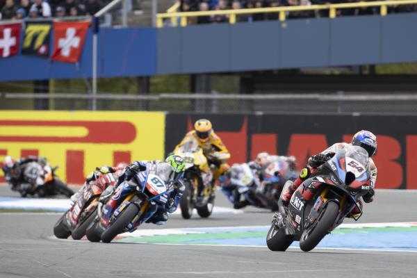 Toprak Razgatlioglu leads Remy Gardner, 2024 Dutch WorldSBK. - Gold and Goose