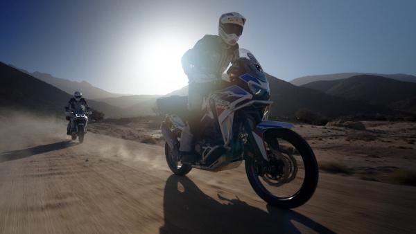 TwocHonda CRF1100L Africa Twins on a dirt road, Honda Adventure Roads 2024, Morocco.