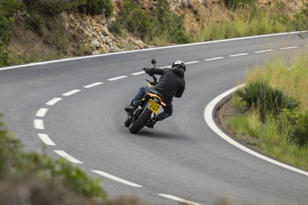 A motorcycle driven on a winding road