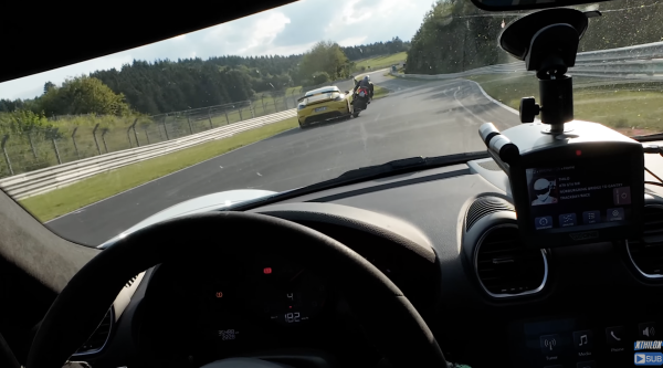 Ducati Panigale and Porsche close call on a racing track