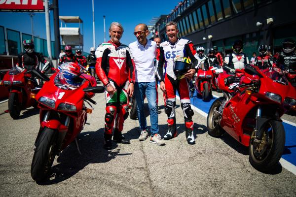 Left to right, Carl Fogarty, Claudio Domenicali, and Troy Bayliss