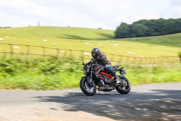 A KTM motorcycle exiting a corner