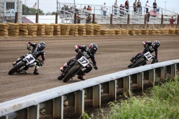 Three Indian flat track bikes riding on track