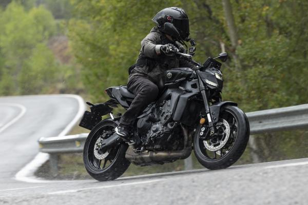 A Yamaha MT-09 Y-AMT being ridden in the rain