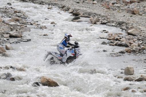 Honda Africa Twin riding through water