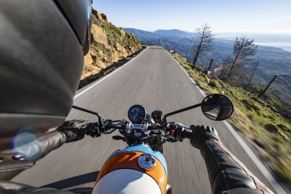 Riding a mountain road on the Speed Twin 900