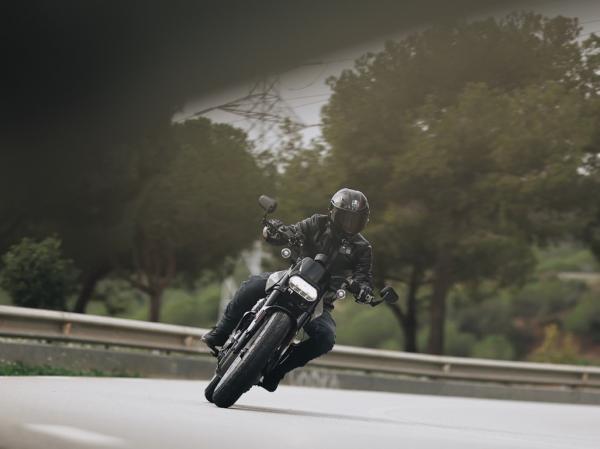 A motorcycle riding through a bend