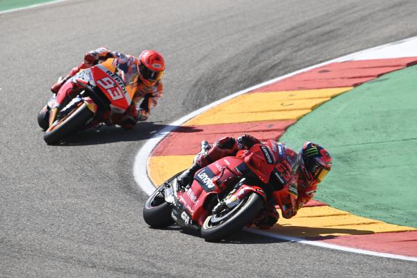 Francesco Bagnaia leads Marc Marquez, 2021 MotoGP Aragon Grand Prix. - Gold and Goose