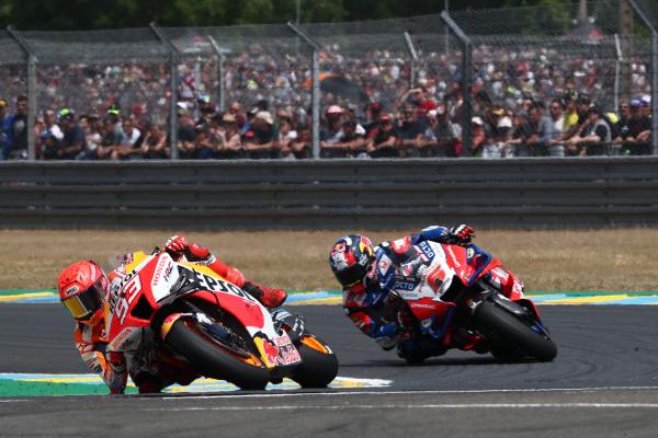 Marc Marquez leads Johann Zarco, 2022 French Grand Prix. - Gold and Goose