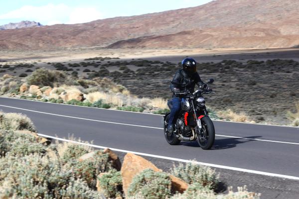 Triumph Trident cornering on a mountain road