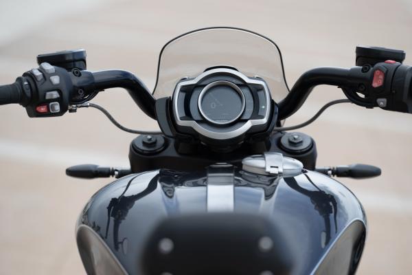 a motorcycle being ridden along a road