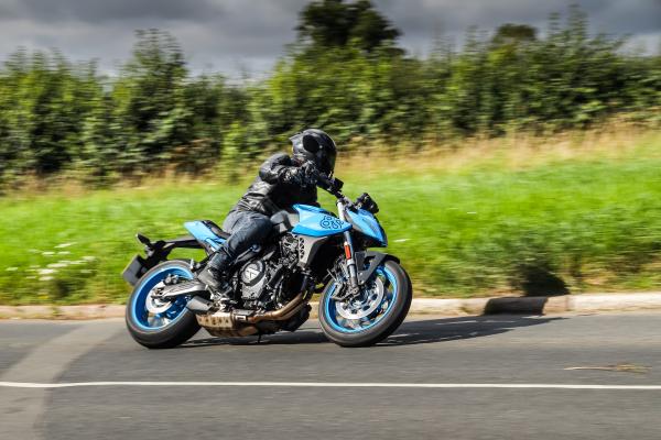 A motorcycle riding around a corner