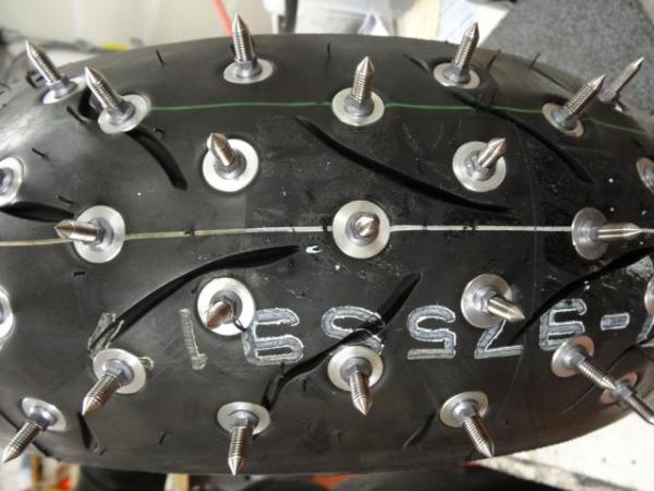 Spiked ice race tyres