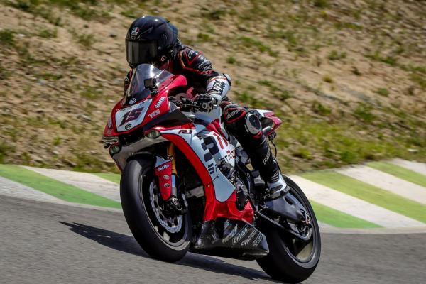 A Yamaha R1 race bike cornering on track