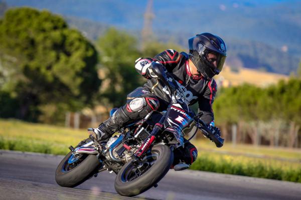 A mini supermoto bike taking a turn