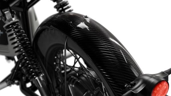 A carbon fibre mudguard on a motorcycle
