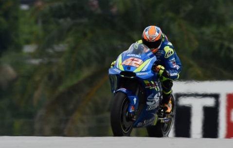 Alex Rins' MotoGP bike catches fire in the Sepang pit lane