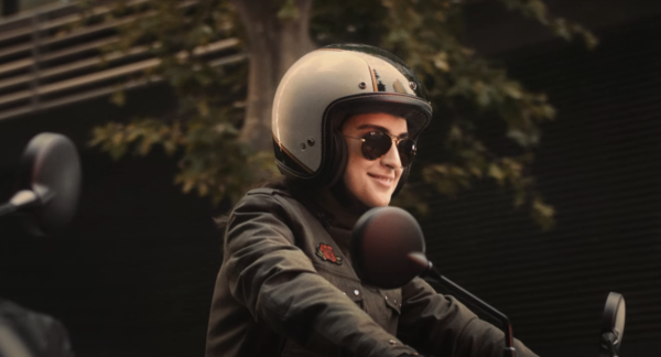 grinning motorcyclist
