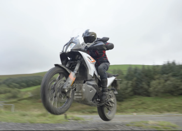 A motorcycle being ridden off-road