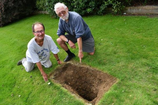 Surrey gardener finds wartime motorcycle buried in garden