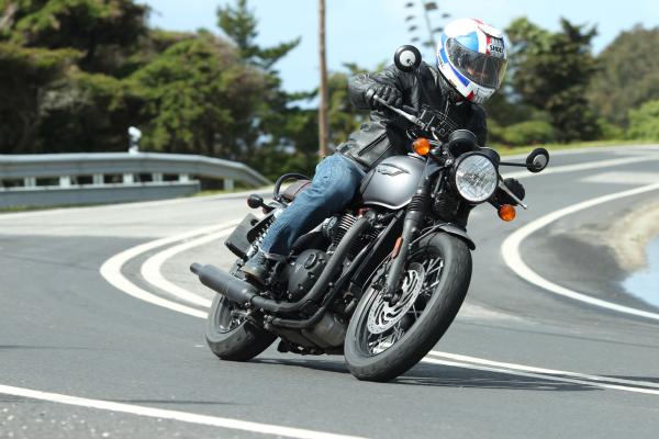 A 2016 Triumph Bonneville T120 turning a corner