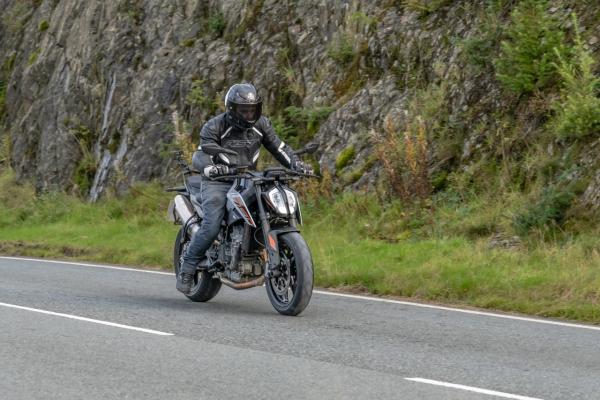 A KTM 790 Duke riding along a road