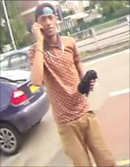 Help catch fake 'good Samaritan' who mugged heavily bleeding motorcyclist