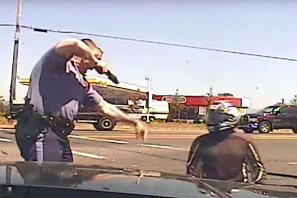 Oregon rider wins $180,170 case against kicking cop