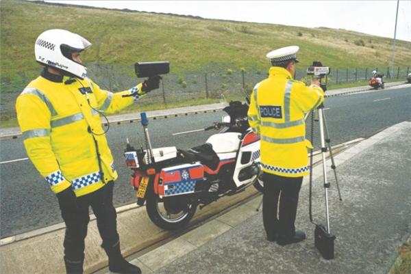 Police hide in bushes to catch speeders