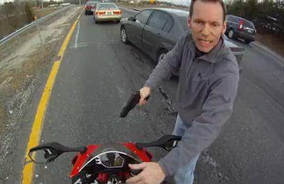 Charges dropped against speeding biker who filmed gun-toting cop during arrest 