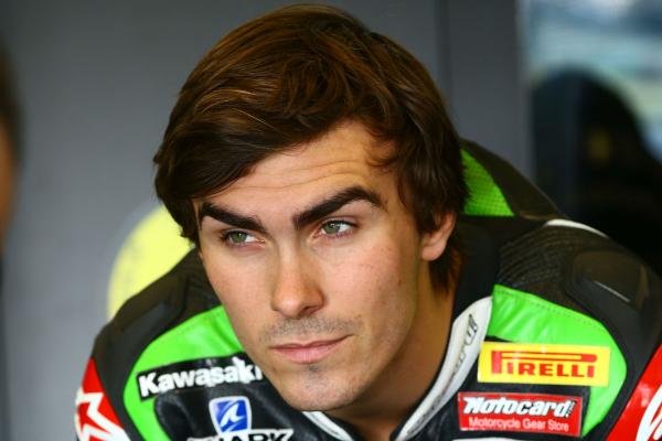 NGM Forward Racing sign Loris Baz