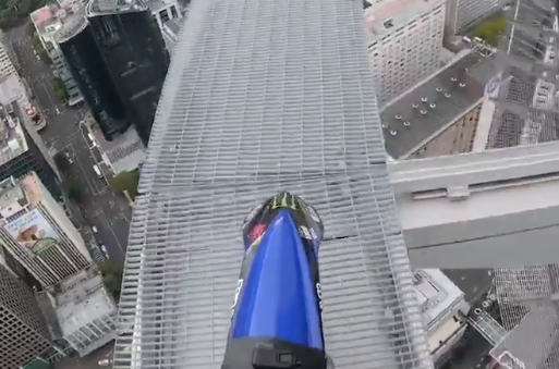 WATCH: Terrifying moment FMX rider teeters along 1000ft high walkway