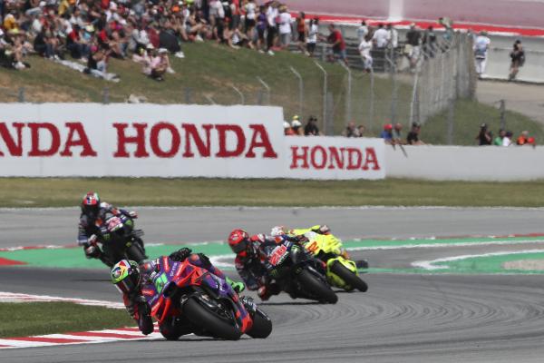 Franco Morbidelli leads Fabio Quartararo, 2024 MotoGP Catalan Grand Prix. - Gold and Goose