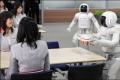 Honda unveil robots that work in pairs
