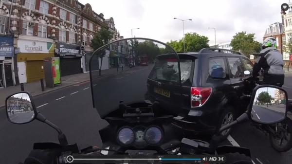 Car pulls across three lanes without indicating, bike hits car. Who do you think is to blame?