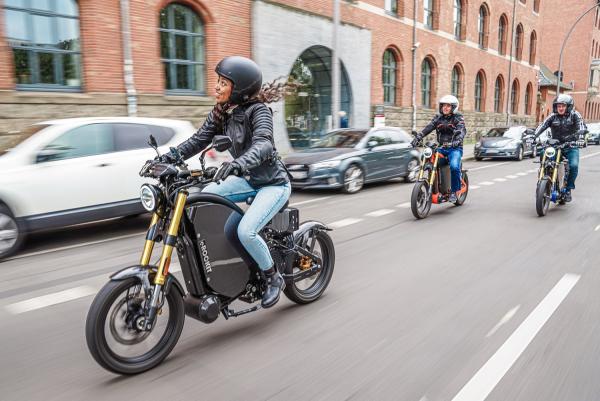 Three eRockits riding through an urban street - eRockit