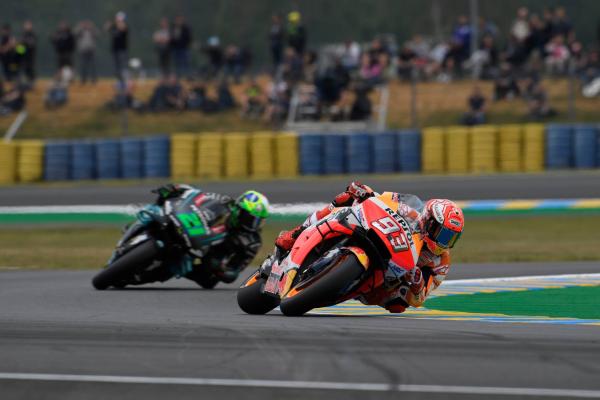 Marquez on pole despite fall in mixed conditions